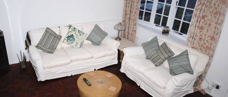 Design Townhome, Multiple Beds, City View | Living area | Flat-screen TV