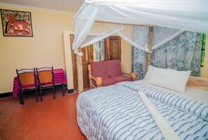 Basic Single Room | Premium bedding, free WiFi, bed sheets - The Better Inn (Moshi)