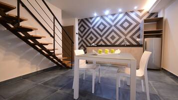 Superior Suite, 2 Bedrooms, Smoking, Kitchenette | In-room dining