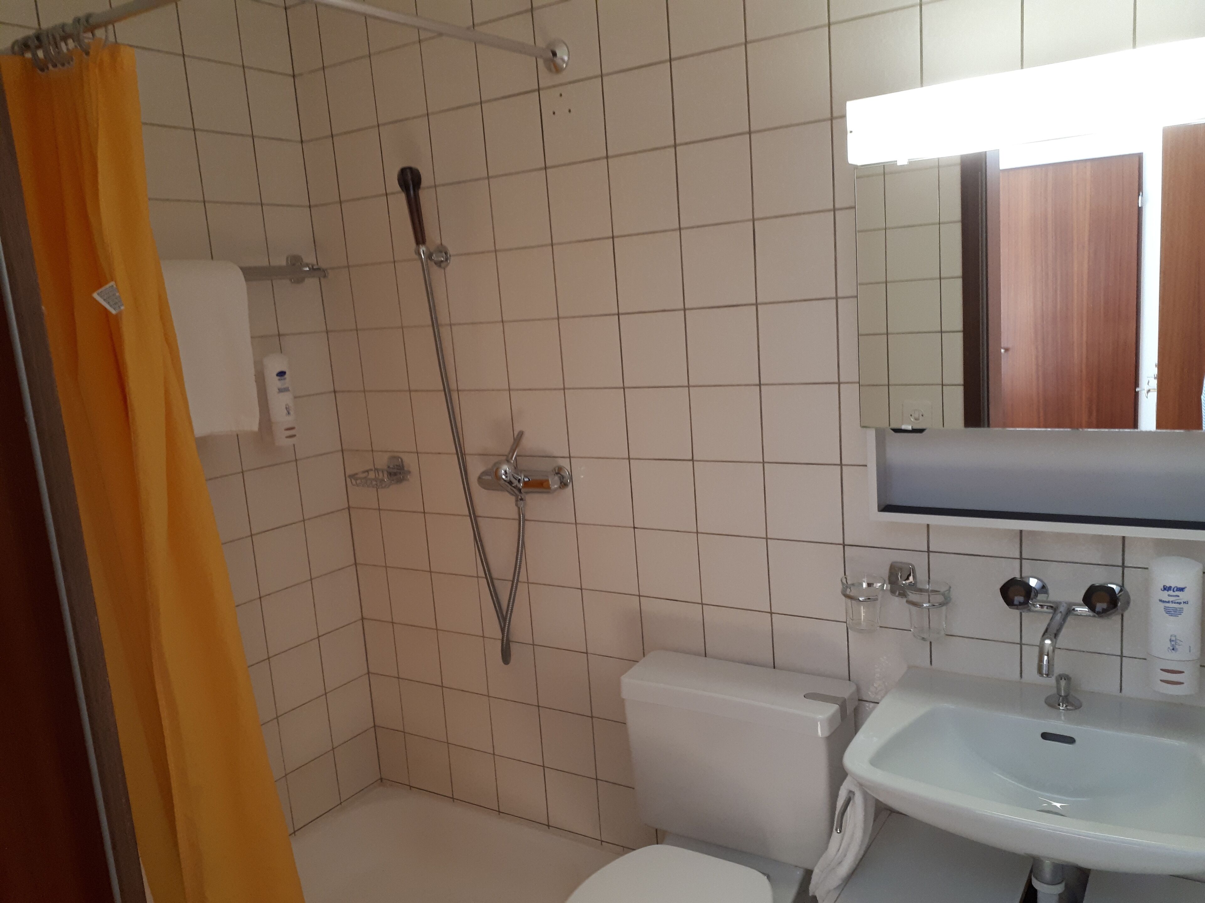 standard quadruple room, multiple beds | bathroom | hair dryer, towels