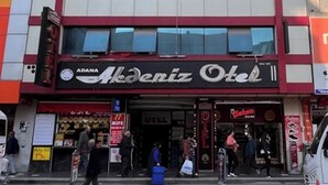 A multi-story building with a prominent 'Adana Akdeniz Otel' sign at the ground level. - Adana Akdeniz Otel (Adana)