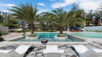 Una piscina al aire libre (de 06:00 a 18:00), tumbonas