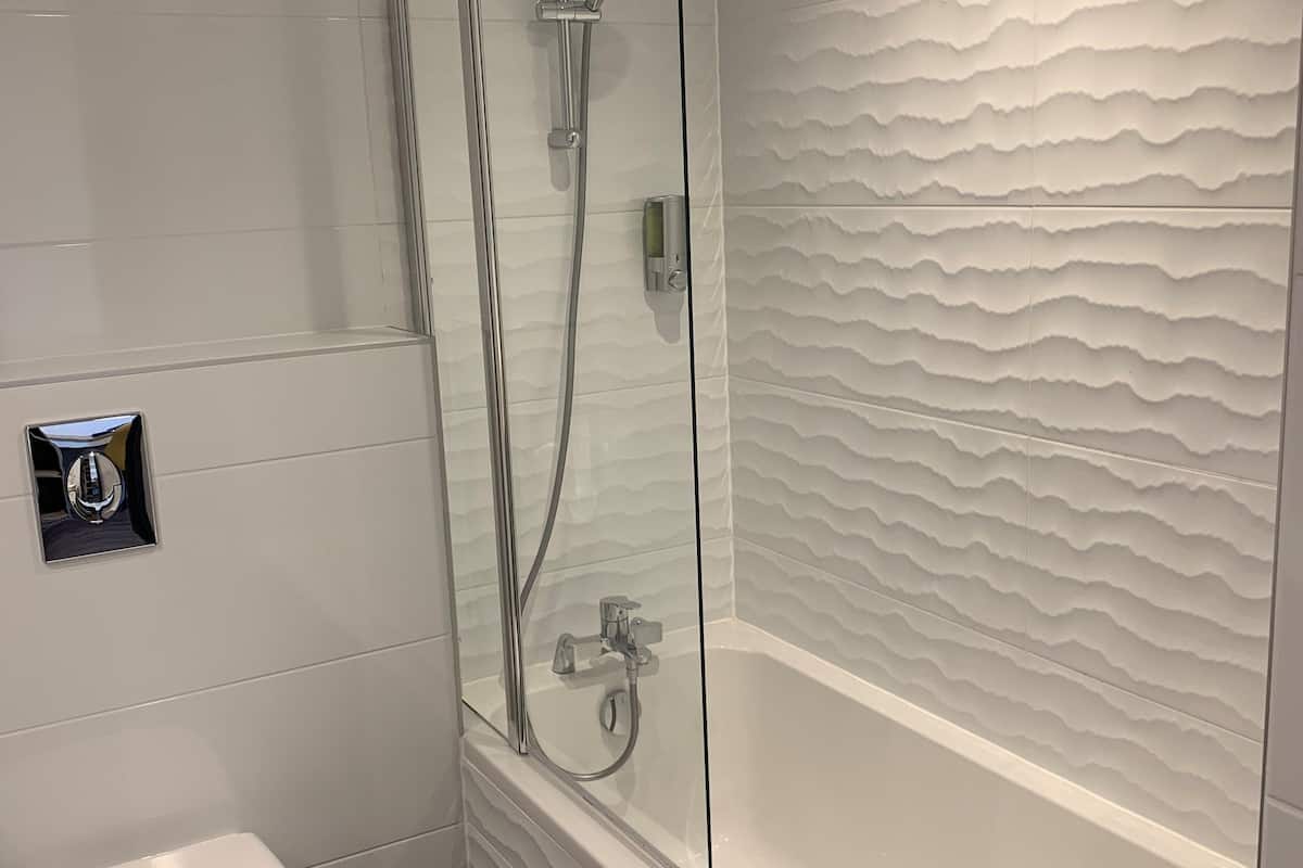 superior double room | bathroom | shower, rainfall showerhead, free toiletries, hair dryer