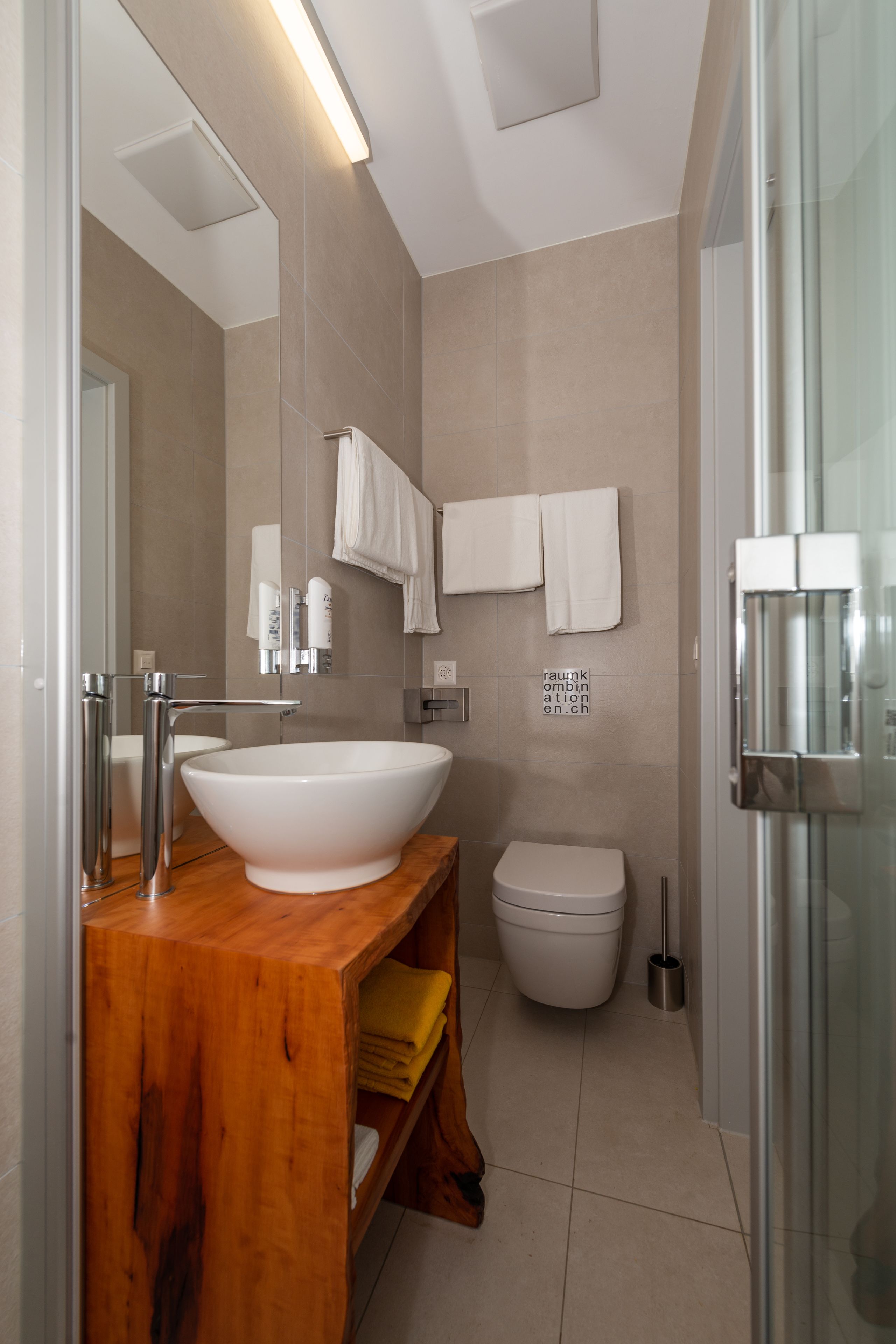 shower, towels, soap, toilet paper