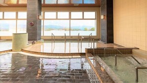 An indoor swimming pool with clear views of mountains through large windows. - Aso Kumamoto Airport Hotel Eminence (Mashiki)
