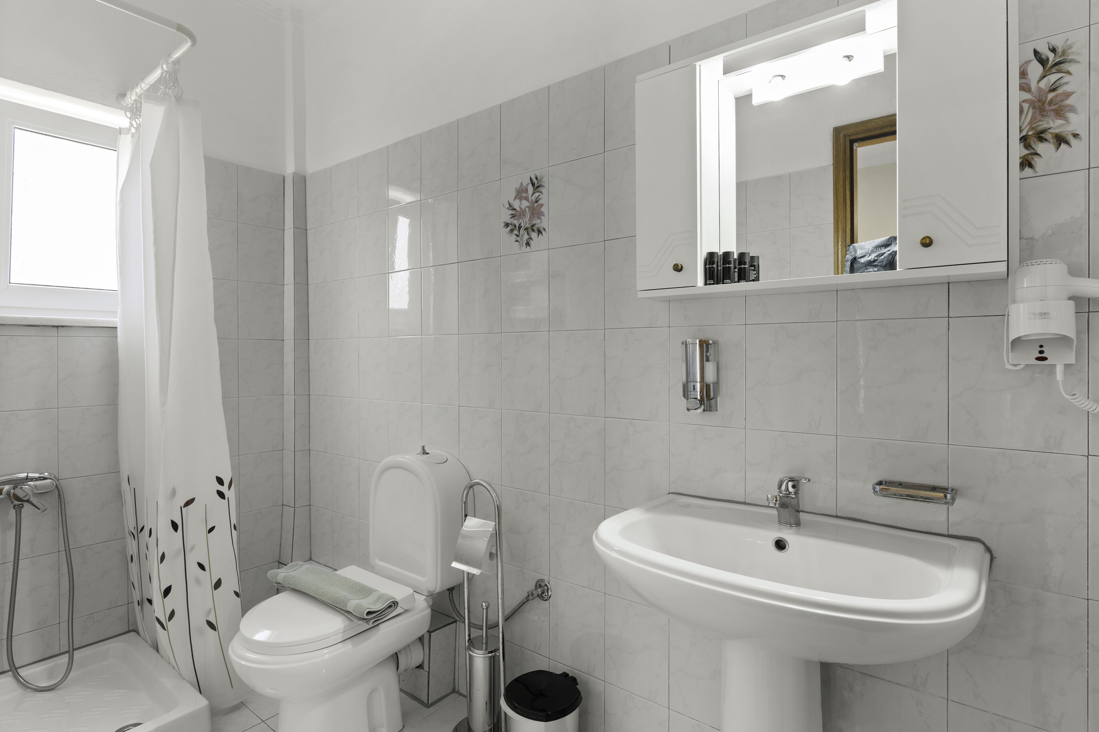 shower, towels, soap, toilet paper