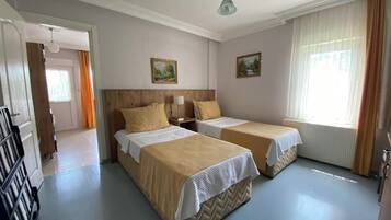 Family Quadruple Room | 1 bedroom, hypo-allergenic bedding, free WiFi, bed sheets