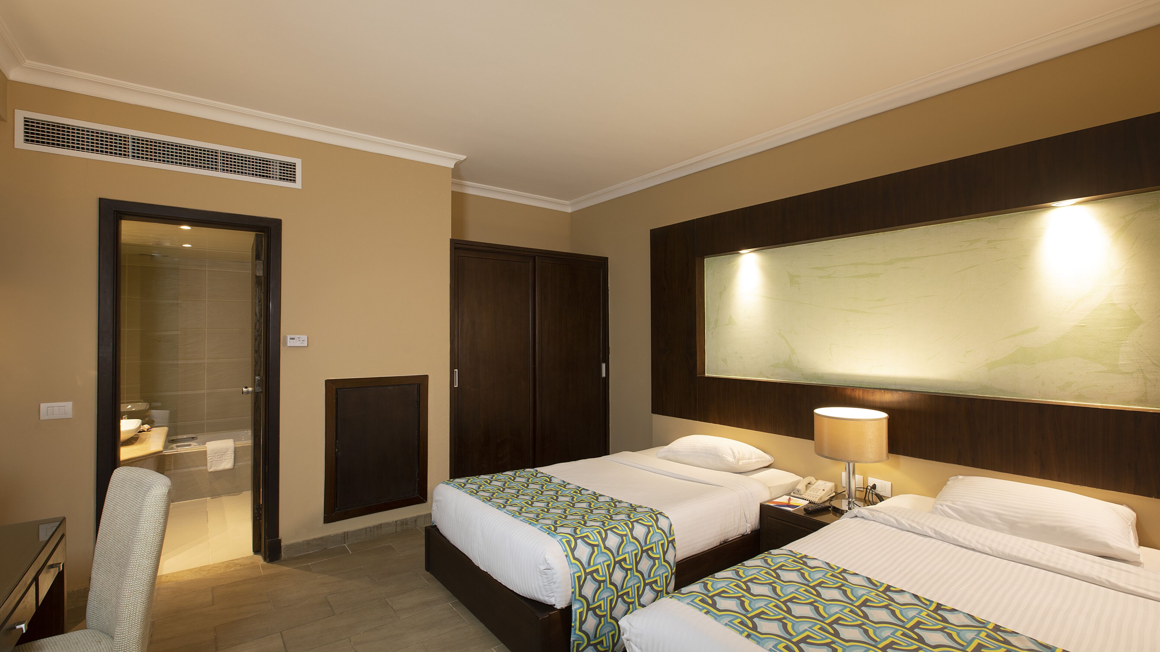 family room | 1 bedroom, minibar, in-room safe, blackout curtains