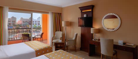 Standard Double Room | Minibar, in-room safe, blackout curtains, iron/ironing board