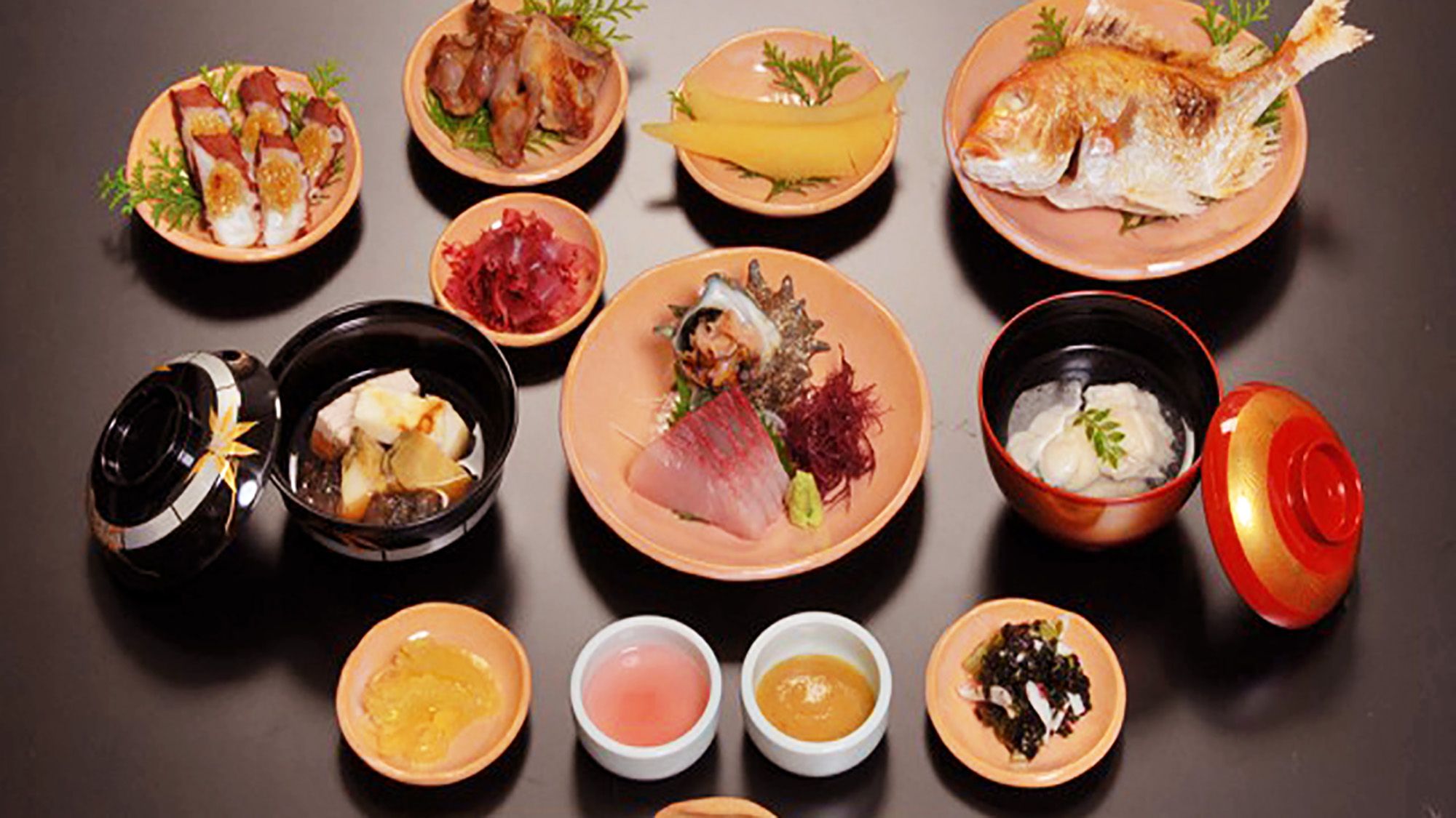 A variety of dishes arranged on a table.