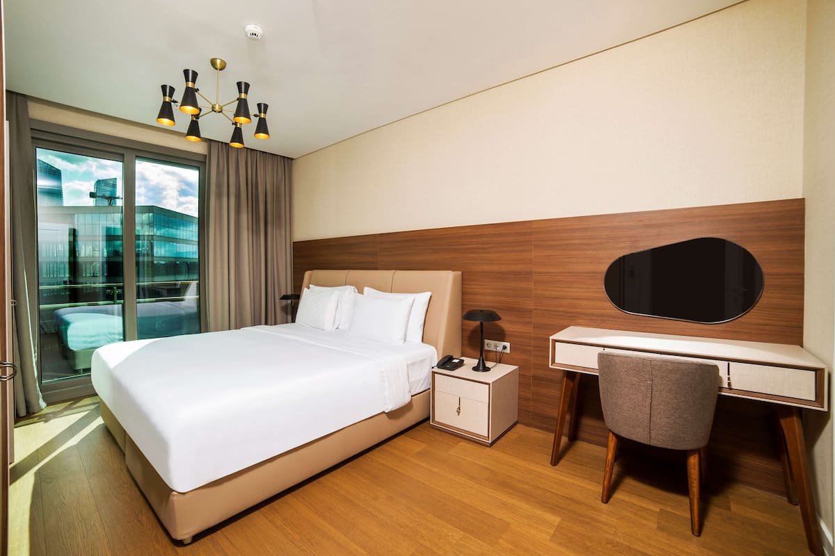 Premium bedding, down duvets, memory-foam beds, in-room safe