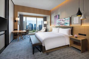 Quarto superior | Edredons de pluma, frigobar, cofres nos quartos
