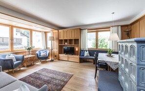 Panoramic Apartment, Garden View | Living area | Flat-screen TV - B&B Villa Angelino (Ortisei)