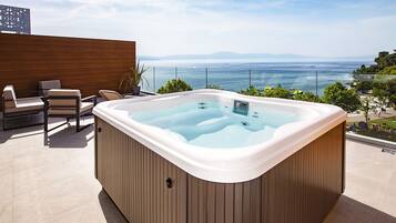 Luxury Suite, Balcony, Sea View | Minibar, in-room safe, desk, blackout drapes