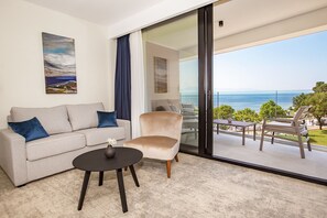 Deluxe Double or Twin Room, Balcony, Partial Sea View | Living room