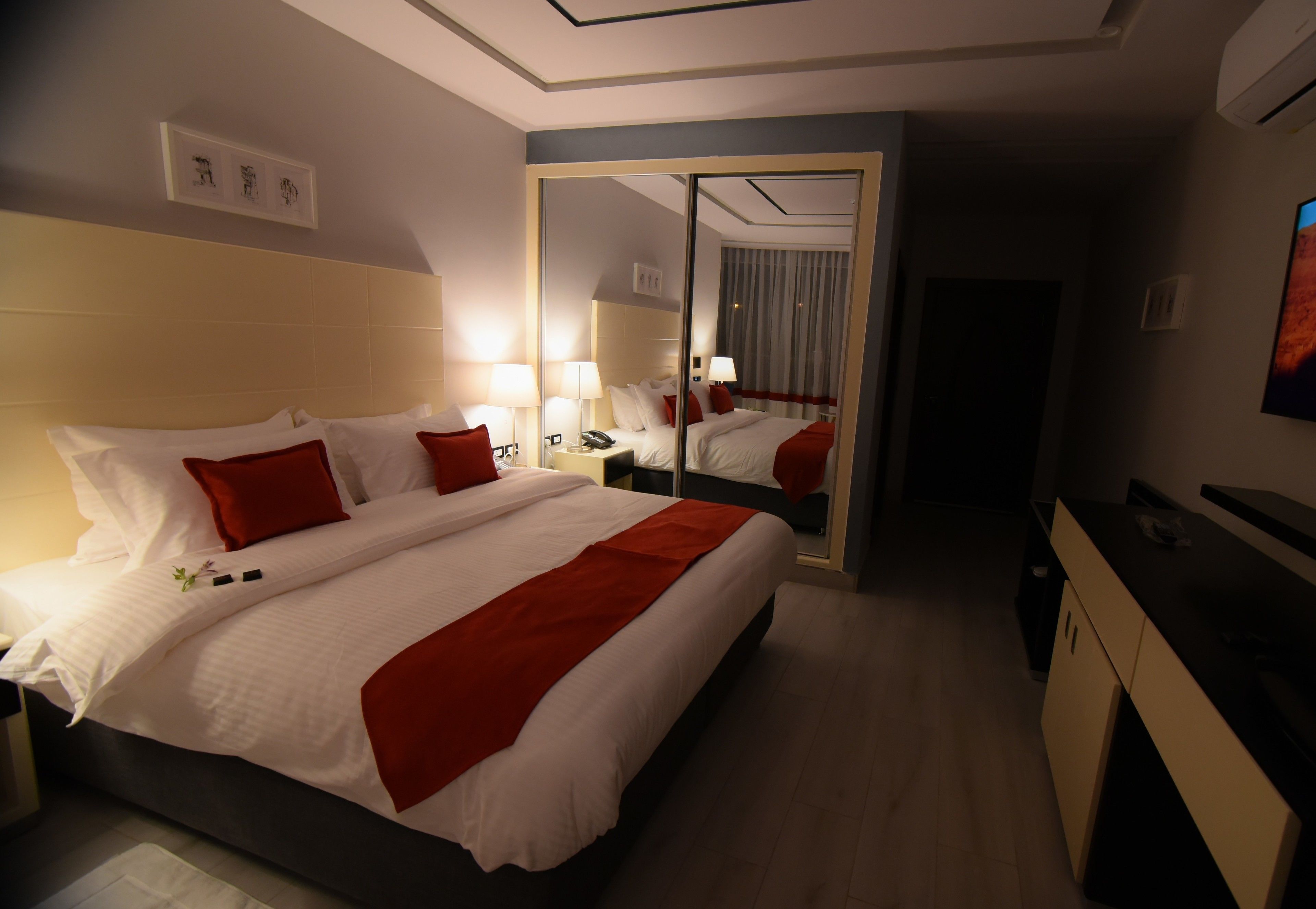 family room | free minibar items, in-room safe, desk, blackout curtains