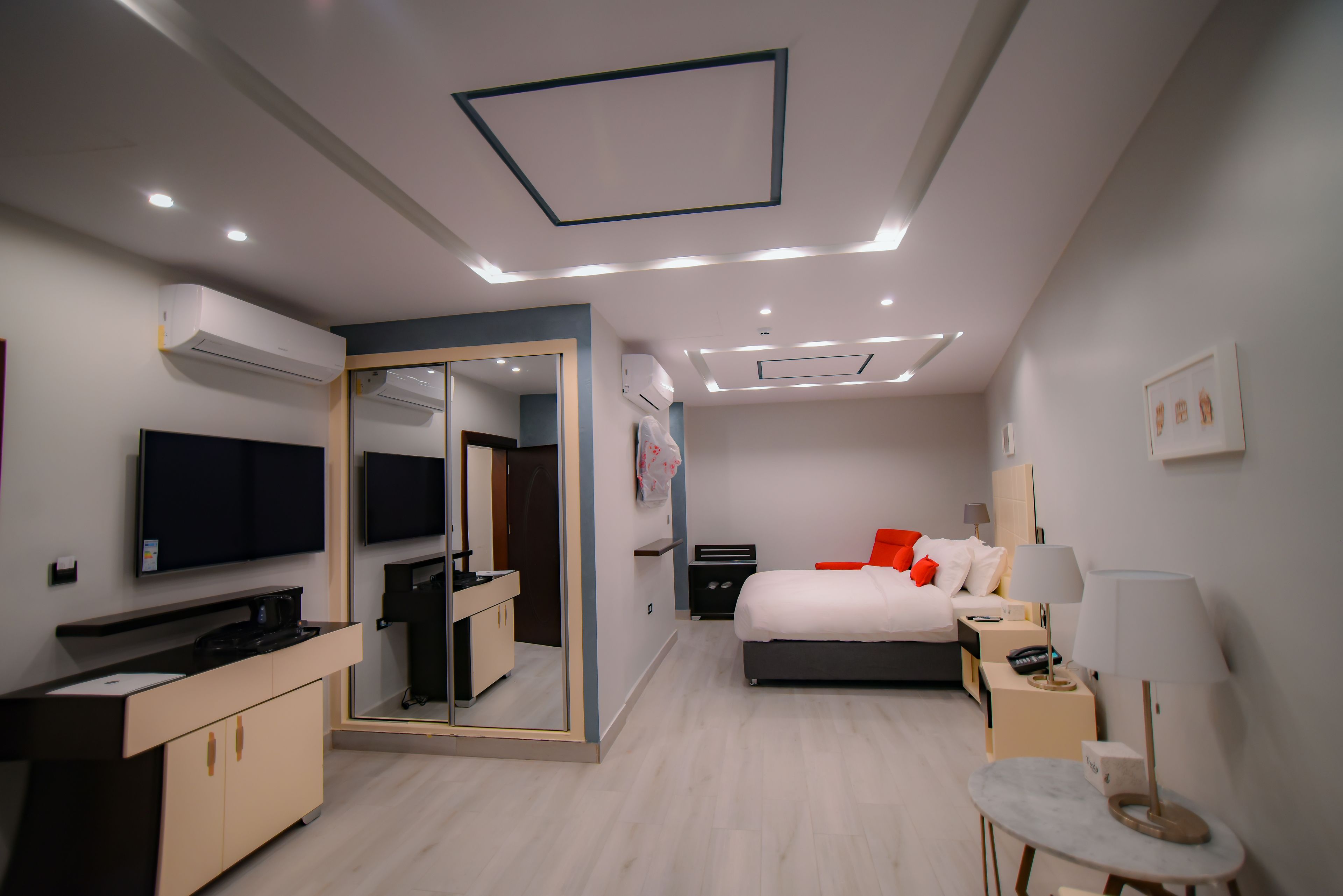 family room | free minibar items, in-room safe, desk, blackout curtains