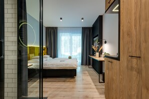 Camas con efecto memoria y caja de seguridad en la habitación