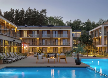 Indoor pool, seasonal outdoor pool, sun loungers, lifeguards on site