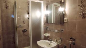 Basic Apartment | Bathroom | Shower, towels, soap, toilet paper