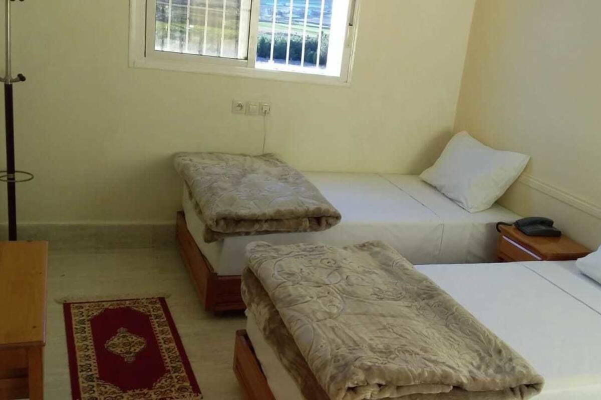 Twin Room, Shared Bathroom | Individually decorated, individually furnished, desk, rollaway beds