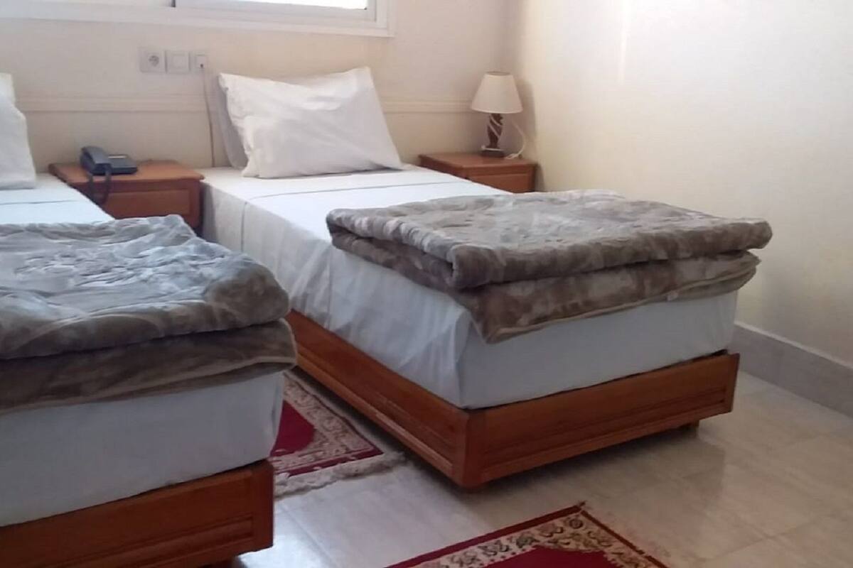 Twin Room, Private Bathroom | Individually decorated, individually furnished, desk, rollaway beds