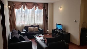 Apartment, 2 Bedrooms | Living room | 32-inch plasma TV with cable channels, TV