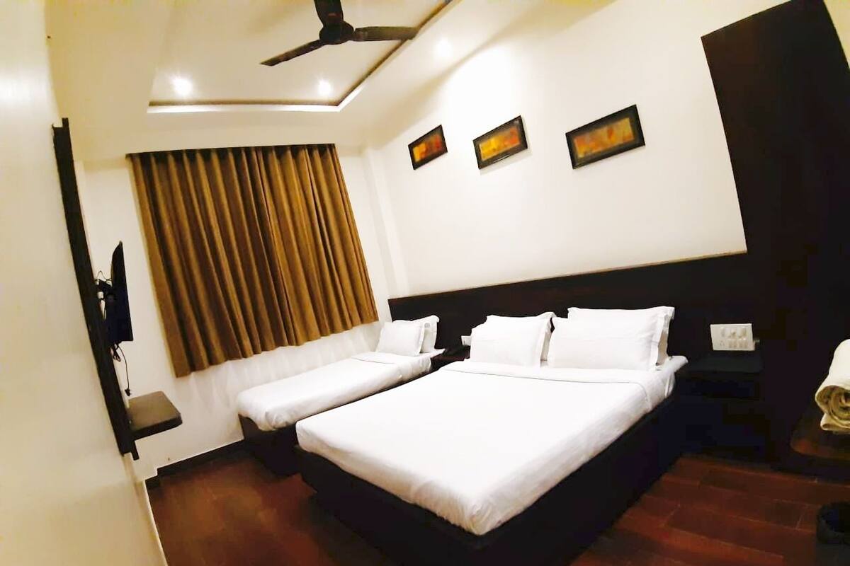 Deluxe Triple Room | 4 bedrooms, premium bedding, memory foam beds, in-room safe