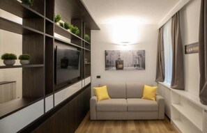 Apartment, 1 Bedroom | Living area | Flat-screen TV - Madonnina Apartment (Milan)