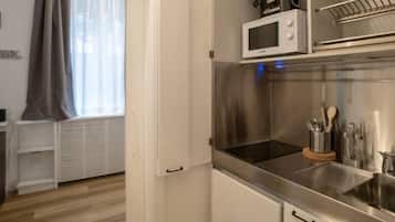 Apartment, 1 Bedroom | Private kitchenette | Full-size fridge, microwave, stovetop, espresso maker