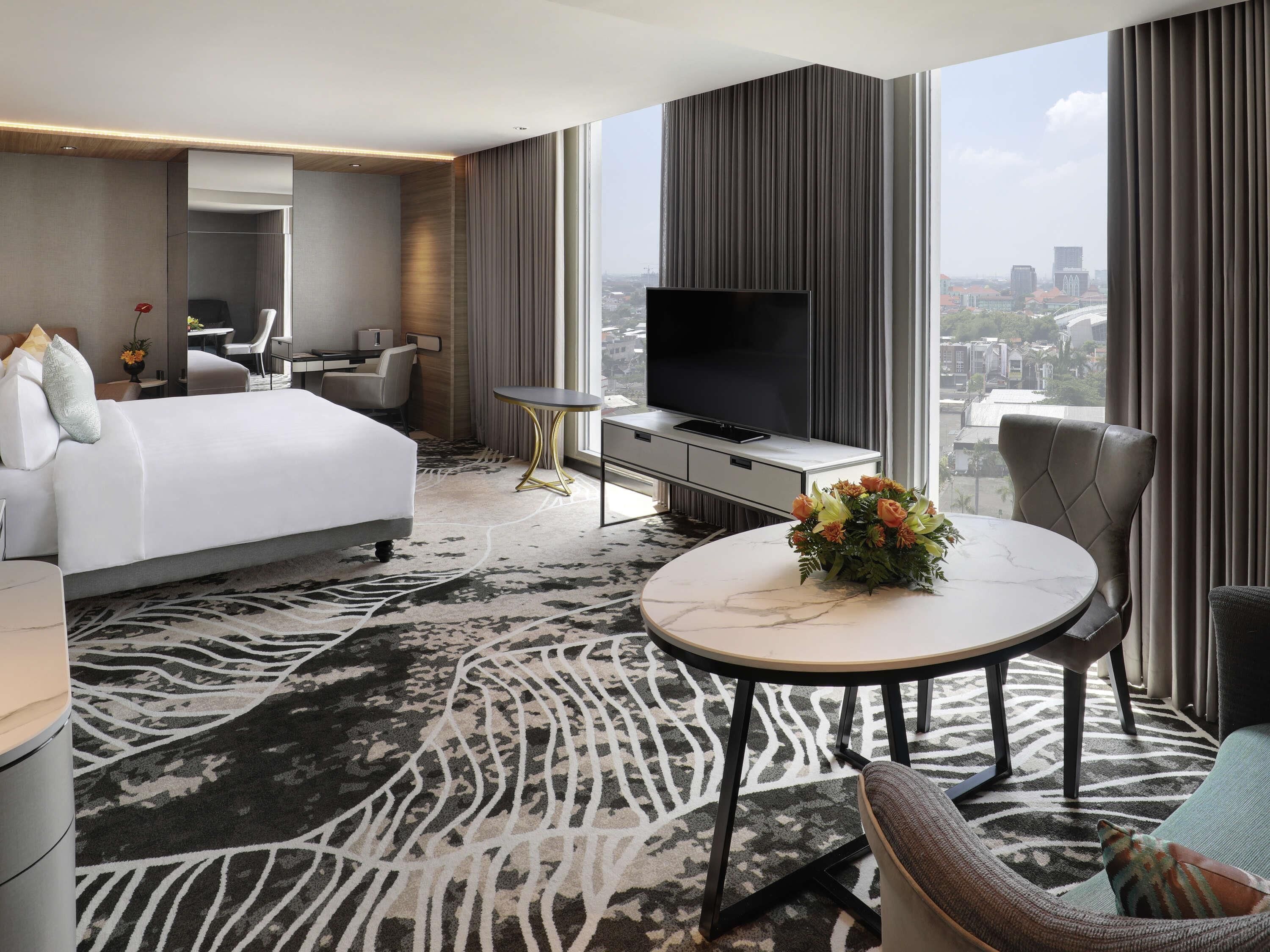 Deluxe Suite, 1 King Bed | Premium bedding, in-room safe, individually decorated