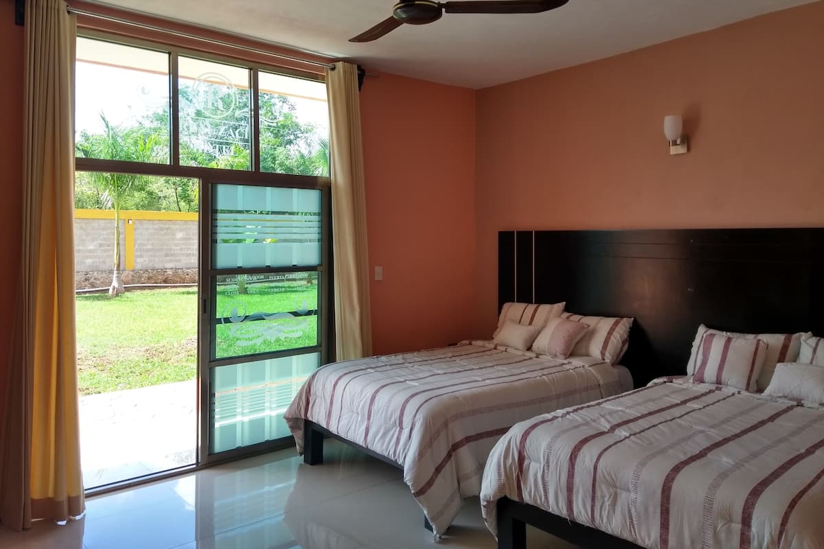 Traditional Double Room, 2 Double Beds, Garden View | Minibar, in-room safe, laptop workspace, blackout curtains