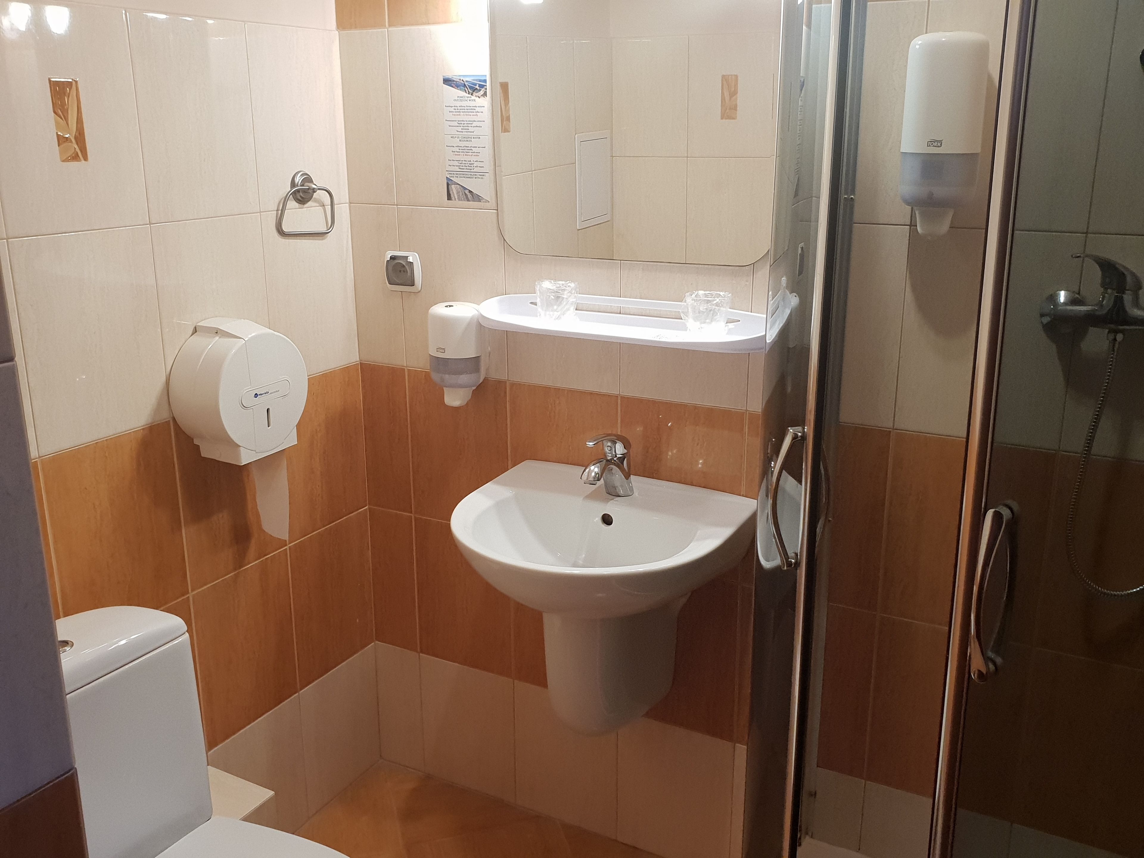 family room | bathroom | shower, hair dryer, towels, soap