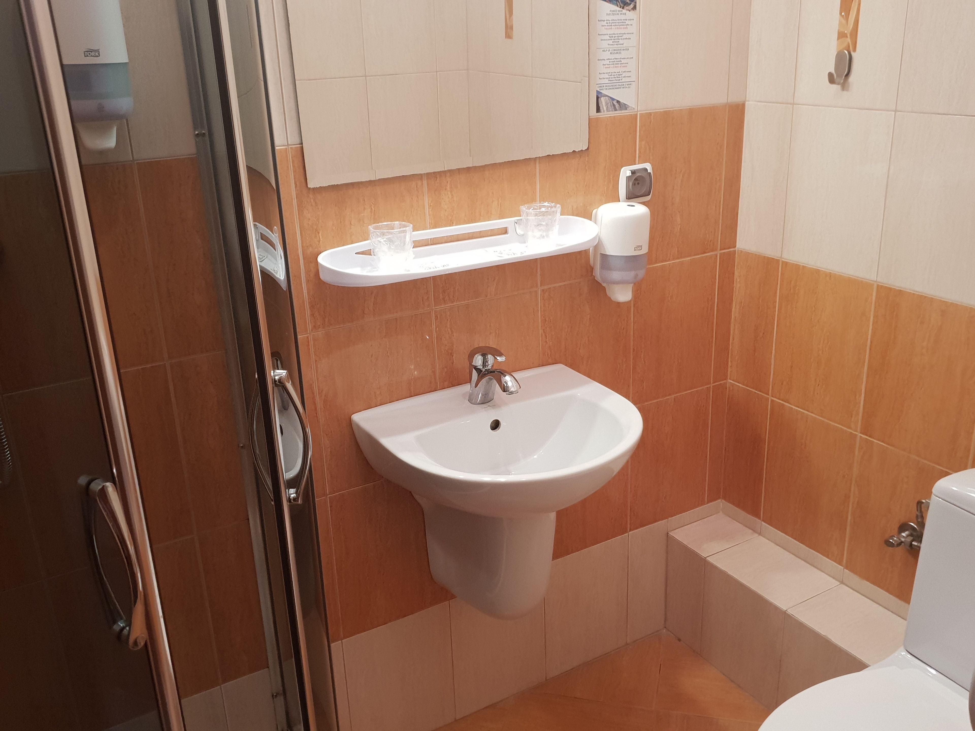 single room | bathroom | shower, hair dryer, towels, soap