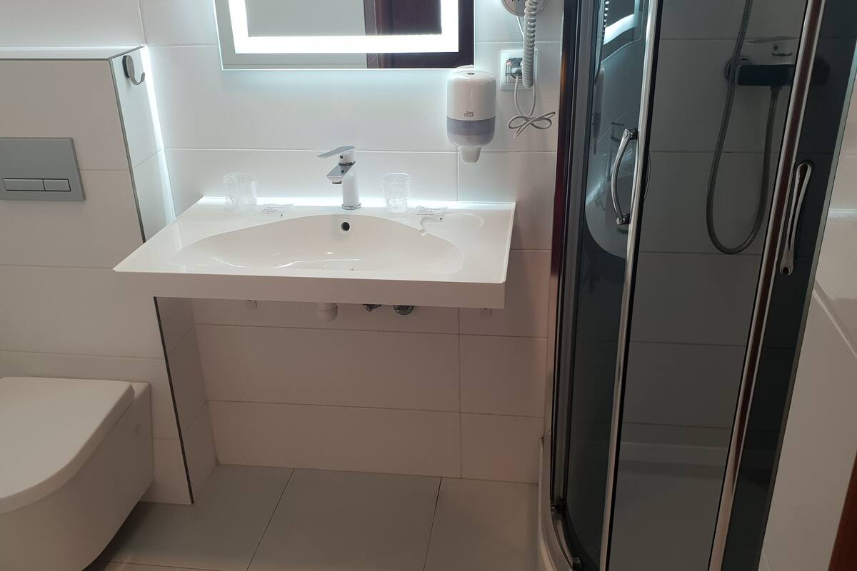 double room | bathroom | shower, hair dryer, towels, soap