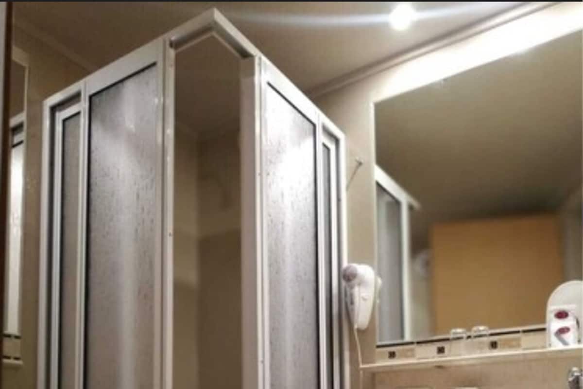 executive single room | bathroom | eco-friendly toiletries, hair dryer, bidet, towels