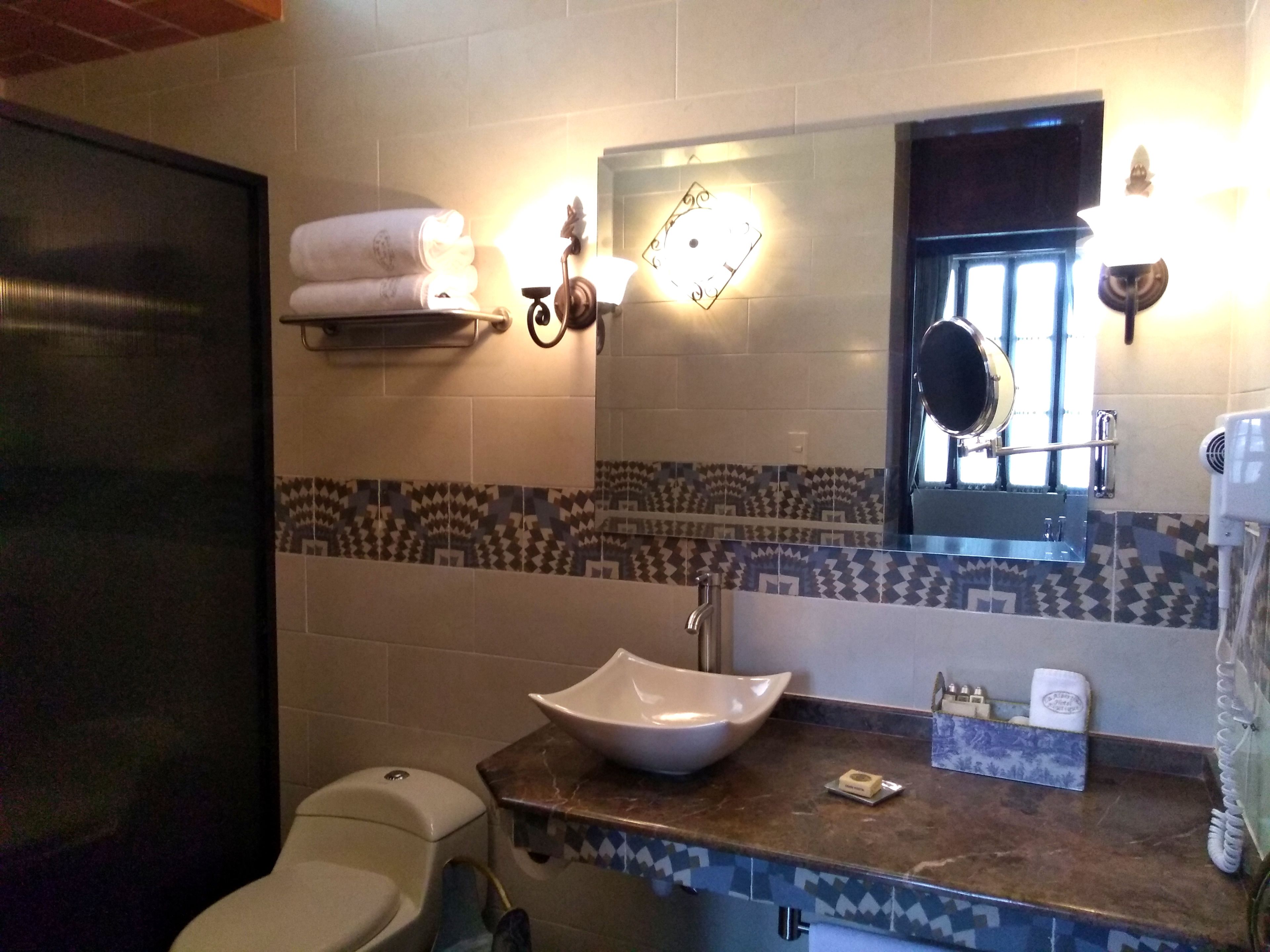 grand quadruple room, garden view (adrienne) | bathroom | hair dryer, towels, soap, shampoo