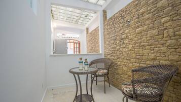 Family Apartment, Multiple Beds, City View | Living room | Flat-screen TV