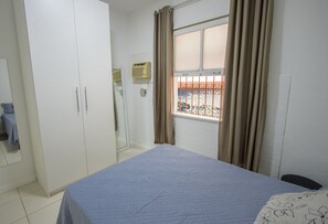 Family Apartment, Multiple Beds, City View | Desk, iron/ironing board, free WiFi, bed sheets