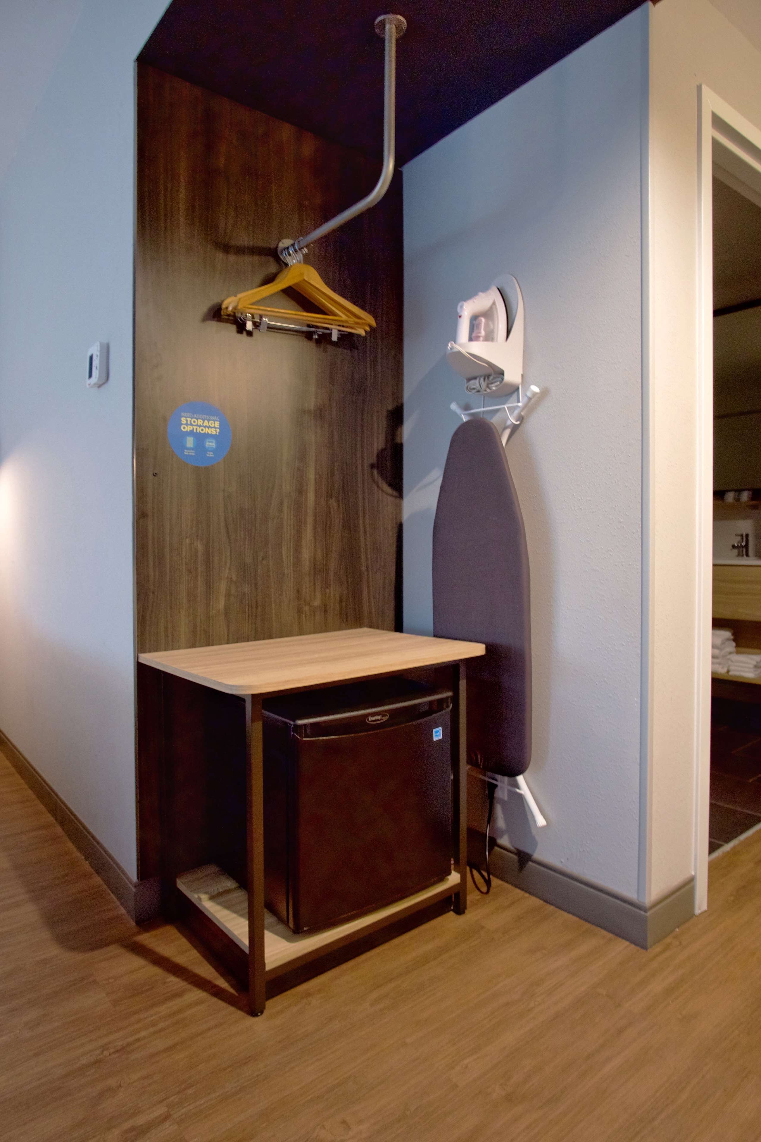 premium bedding, desk, laptop workspace, blackout curtains