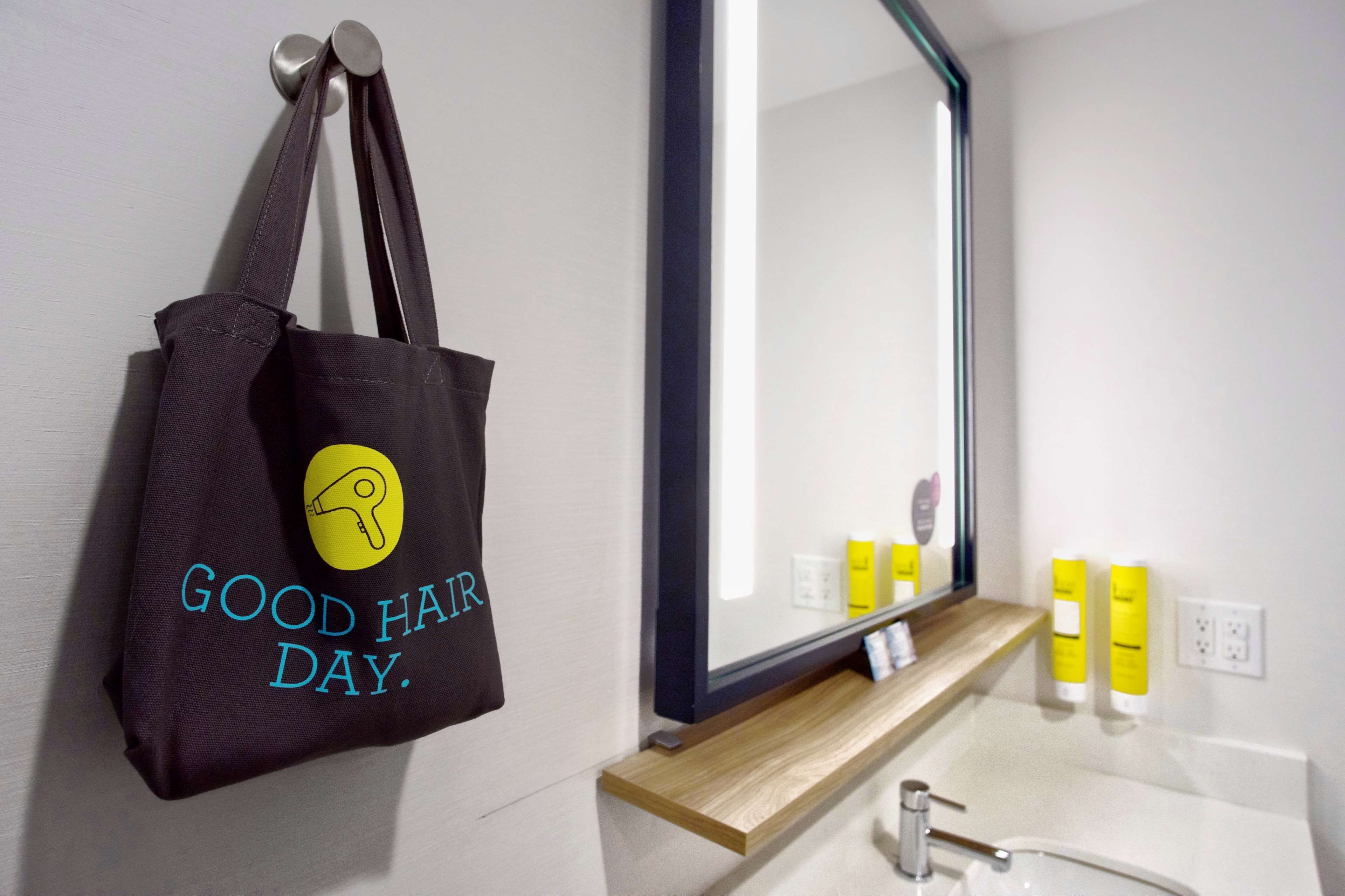shower, eco-friendly toiletries, hair dryer, towels