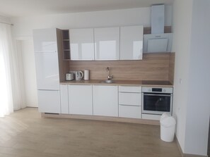 Penthouse, quang cảnh biển | Bếp riêng | Tủ lạnh, lò nướng, bếp nấu, máy rửa bát 