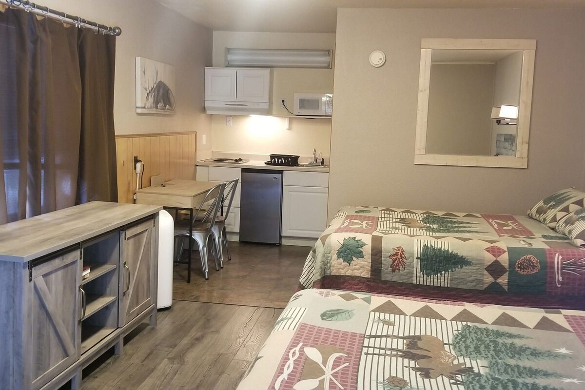 Memory foam beds, desk, laptop workspace, blackout drapes