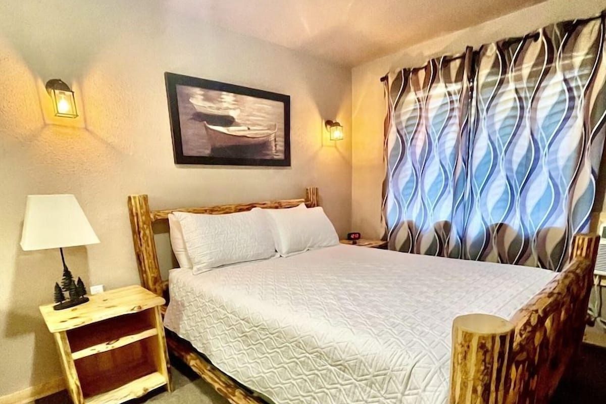 Memory foam beds, desk, laptop workspace, blackout drapes