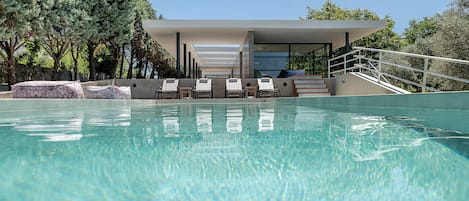 Outdoor pool, pool umbrellas, pool loungers