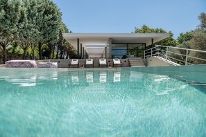 Outdoor pool, pool umbrellas, sun loungers