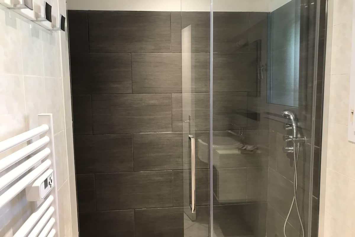 comfort terrace room | bathroom | shower, rainfall showerhead, designer toiletries, hair dryer