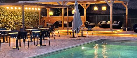 Seasonal outdoor pool, pool umbrellas, pool loungers