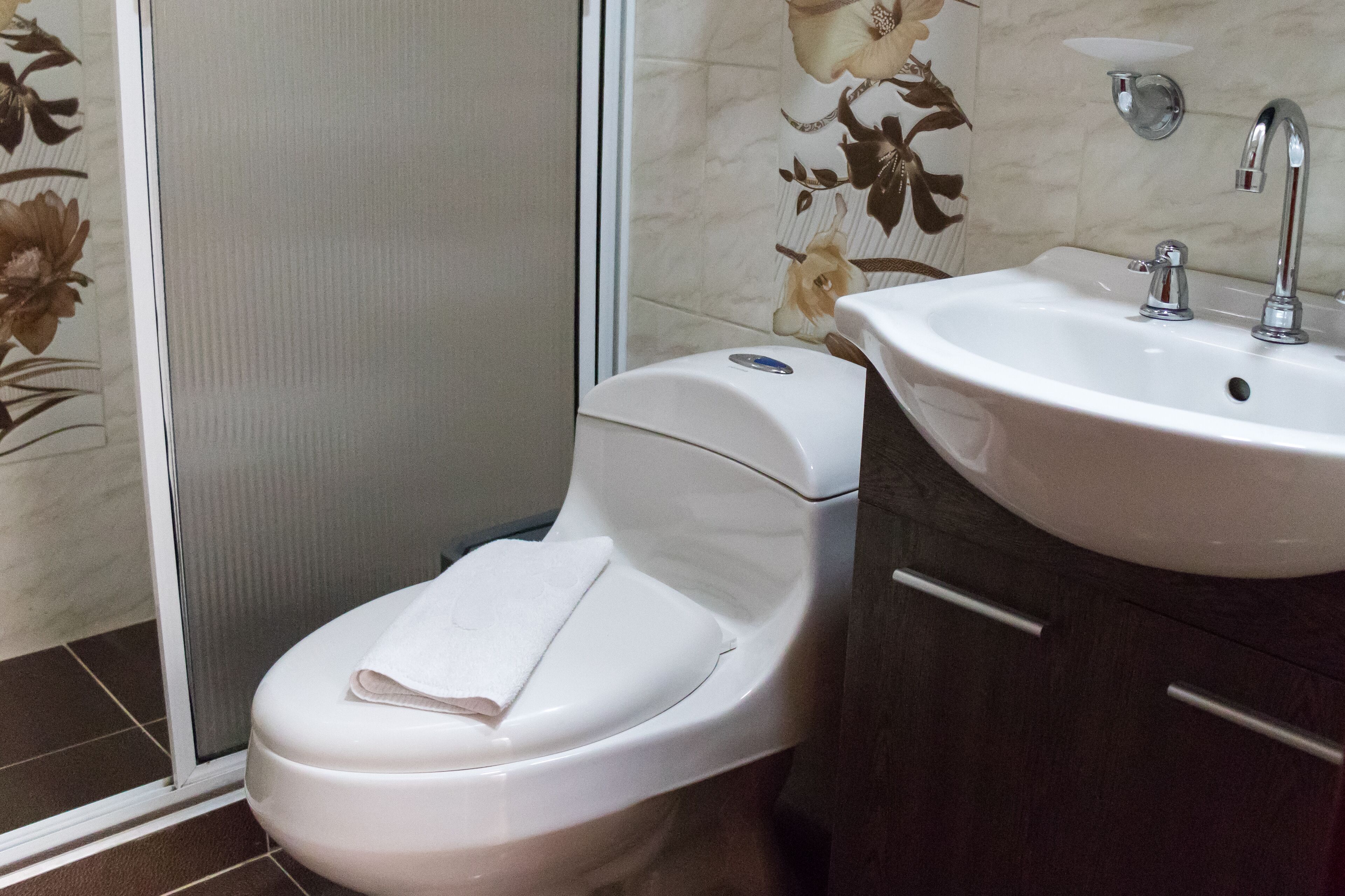 deluxe apartment | bathroom | towels, soap, toilet paper