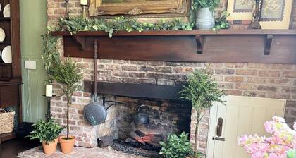 Experience the historic Suite Louise with a parlor and claw tub.